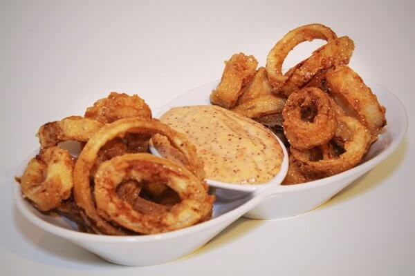 Buttermilk-battered onions rings and calamari with spicy aioli