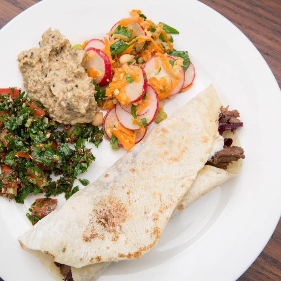 Homemade braised lamb shawarma with tabbouleh, baba ghanouj and chickpea salad