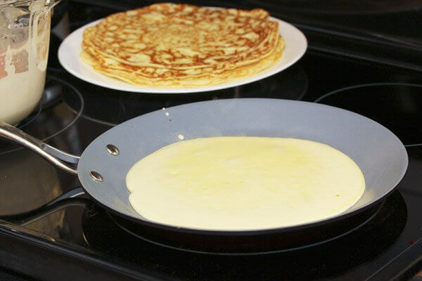 Making crêpes for crêpe Suzette