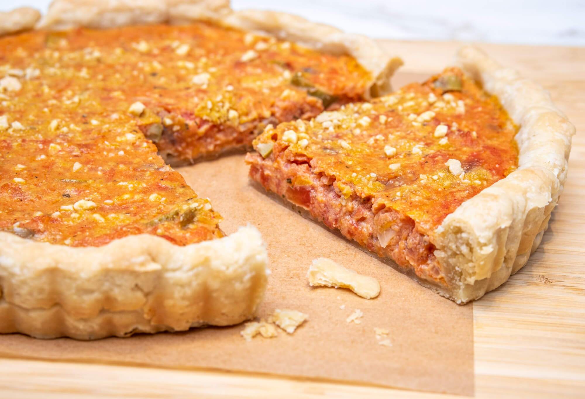 Niçoise tomato quiche with anchovies and olives