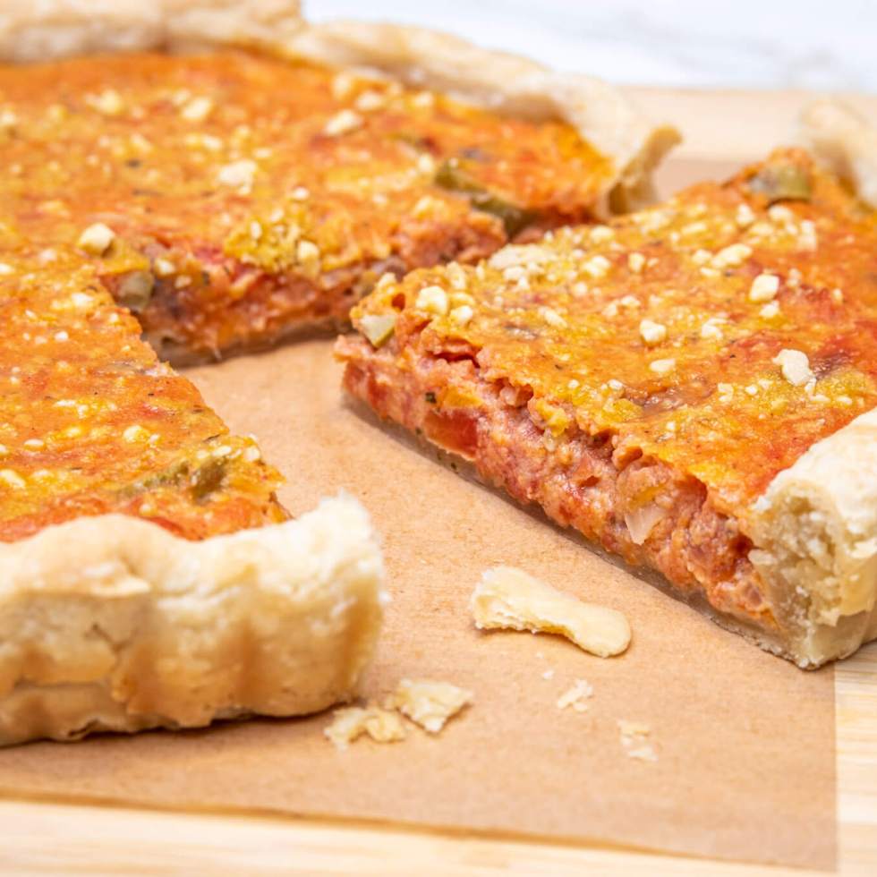 Niçoise tomato quiche with anchovies and olives