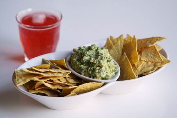 Cilantro-lime guacamole with tortilla chips
